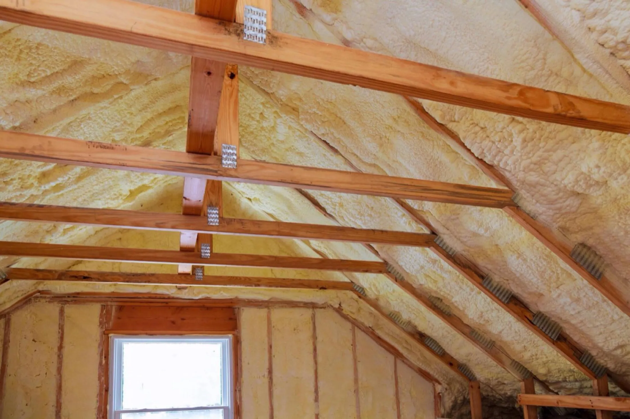 Old attic insulation being removed