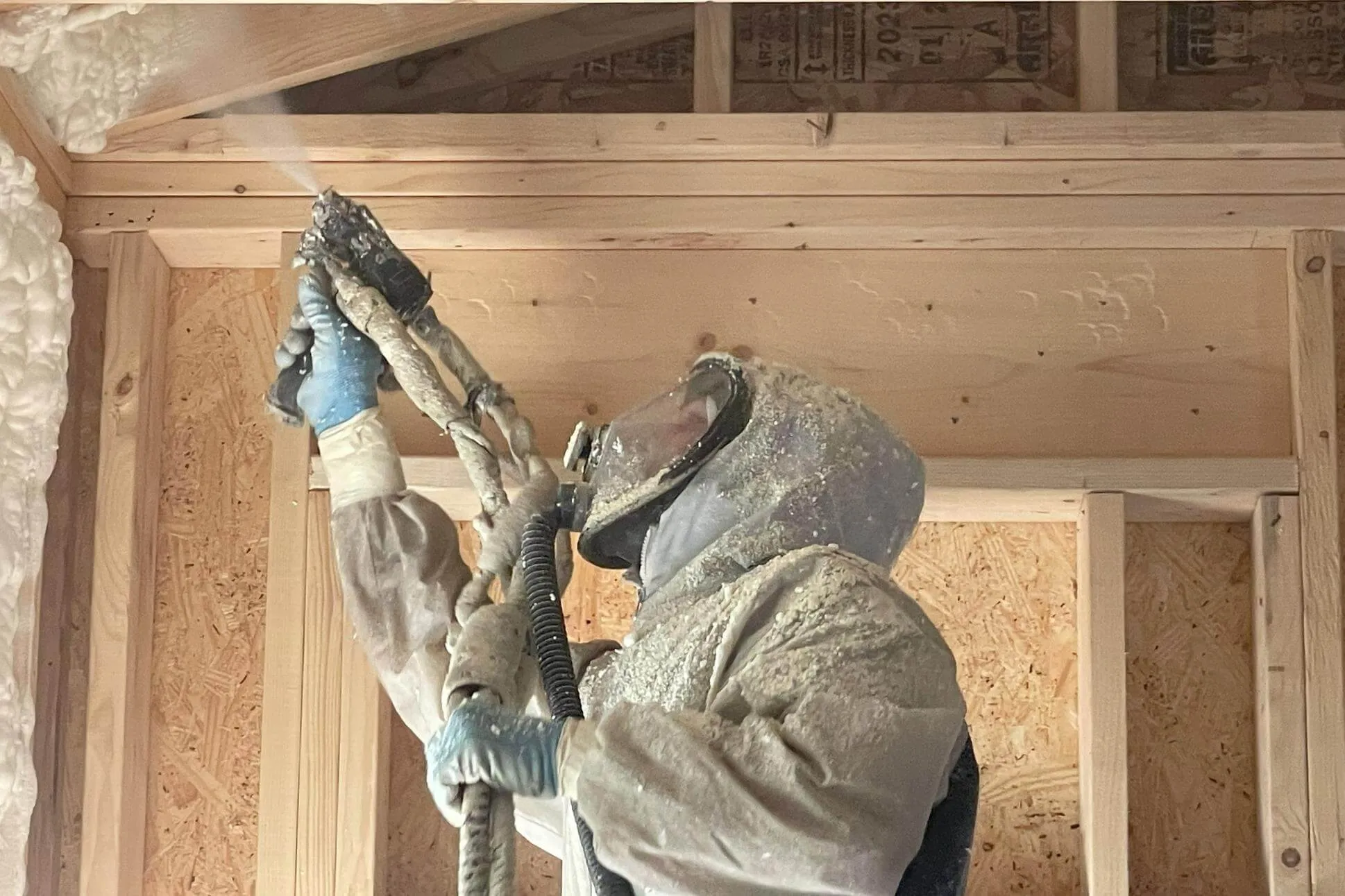 Pole barn interior with finished foam coverage