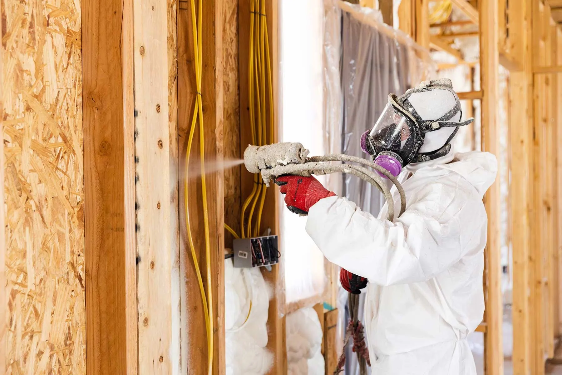 Blown-in loose-fill insulation across an attic floor